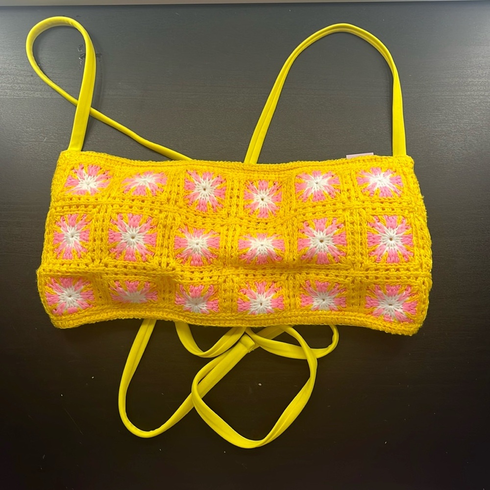 I am selling this cute bright and fun bikini top! Never worn